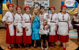 Team members posing together at the cook-off