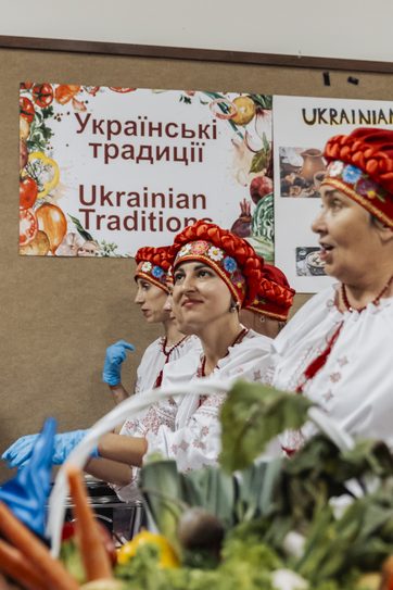 Women in red wreaths at the Ukrainian Traditions display